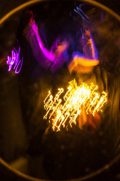 istock abstract designs with lights in the dark. Lightpainting 1125849007