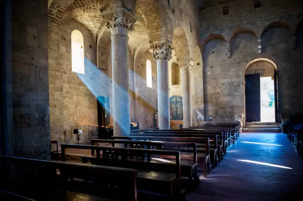 The abbey of Sant'Antimo is a monastic complex in Olivetano located near Castelnuovo dell'Abate, within the municipality of Montalcino, in the province of Siena. It is one of the most important architectures of the Tuscan Romanesque style.