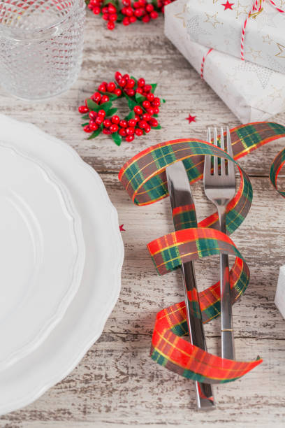 istock Winter table place setting with Christmas or New Year decorations. 1125853705