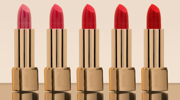 istock Red lipstick in a beautiful case on a bright background Six different shades 1125855432
