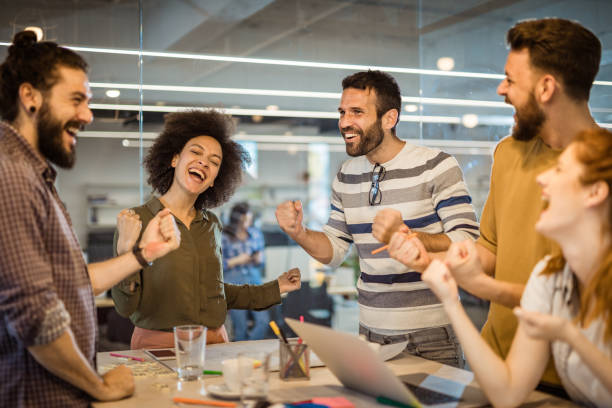 istock Celebrating success in the office! 1125857638
