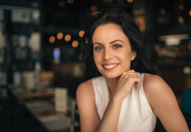 istock Young girl looking directly at camera 1125859135
