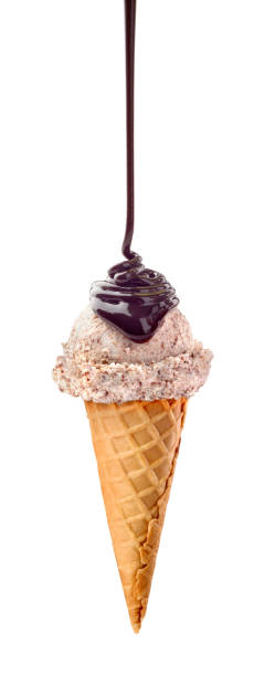 istock ice cream watered with chocolate syrup 1125860074