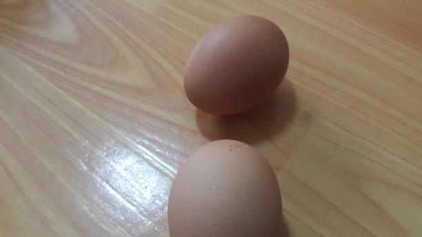 istock Fresh farm chicken eggs in an egg-carton  placed in market 1125860332