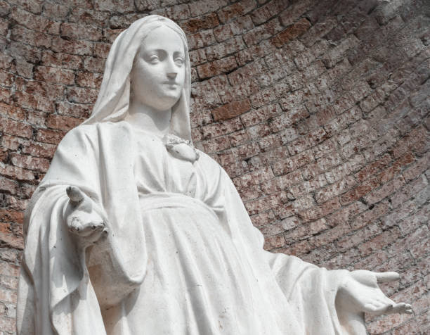 istock Statue in stone of Virgin Mary 1125866312