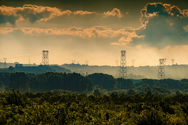 istock Electric power pylons and overhead lines 1125869037