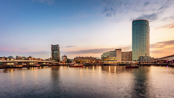 Belfast River Lagan Panorama at Night Northern Ireland Panorama of Belfast River Lagan Waterfront Cityscape and Lagan Bridge at Sunset Twilight. Lagan Bridge Waterfront, Belfast, Northern Ireland, UK northern ireland photos stock pictures, royalty-free photos & images