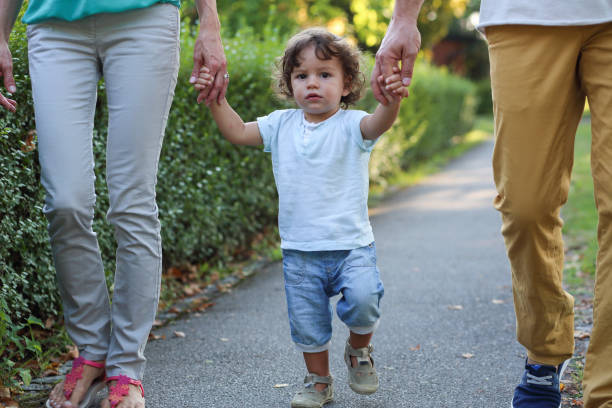 istock Young family on a walk 1125871758