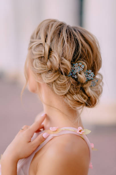 bride hair style close-up rear view of bride's wedding hairstyle, close up hairstyle stock pictures, royalty-free photos & images