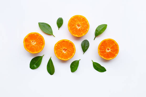 istock Orange fruits with  leaves on white background. 1125873478