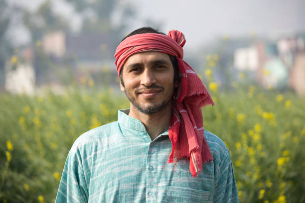 istock Indian farmer standing in agricultural field 1125873507