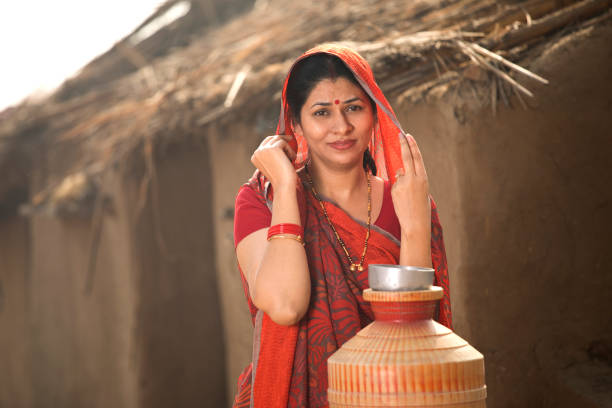 istock Indian woman standing at village 1125873569