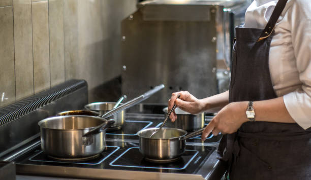 istock Cook works in the kitchen. Cooking food. Restaurant, chef. 1125875188