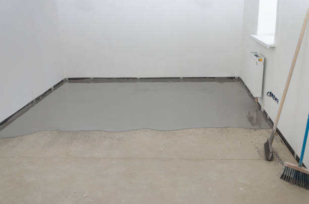 istock Self-leveling epoxy. Leveling with a mixture of cement floors 1125875368