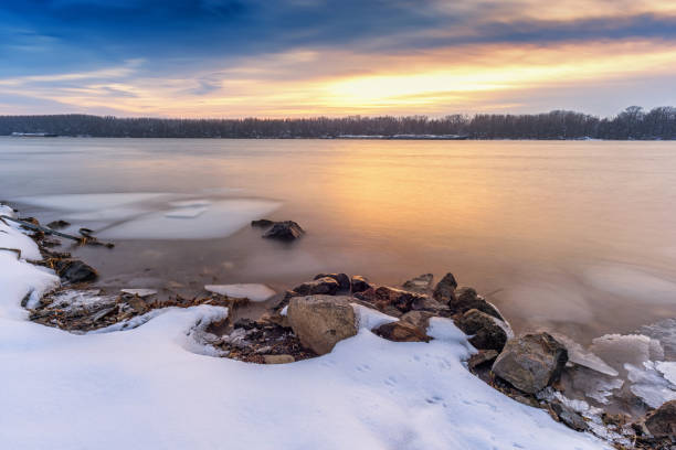 istock Winter sunset at Danube River in Europe 1125875446