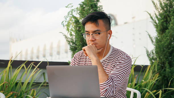istock Asian millennials with laptop at the rooftop 1125876996