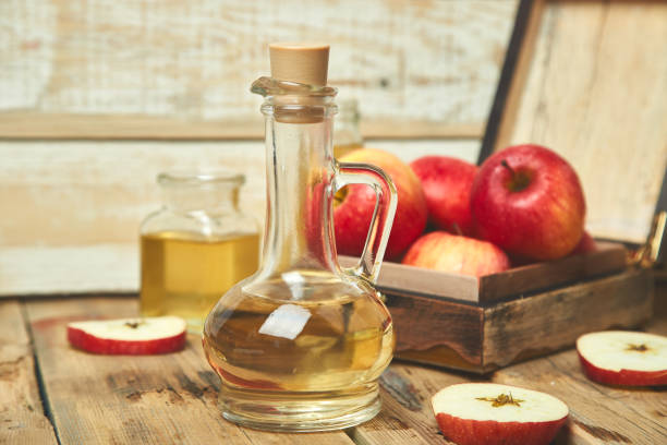 istock Apple cider vinegar. Bottle of apple organic vinegar 1125880443