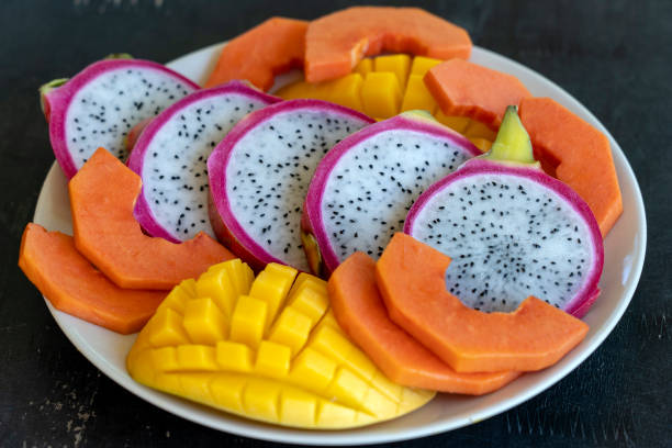 istock Tropical fruits assortment on a plate, close up 1125882544