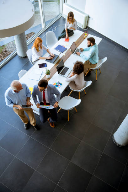 istock Top view at business people in the office 1125883823