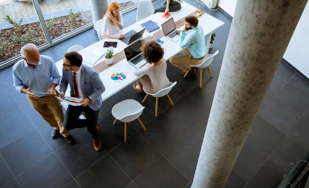 istock Top view at business people in the office 1125883826