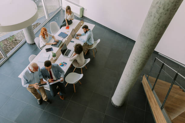 istock Top view at business people in the office 1125883832
