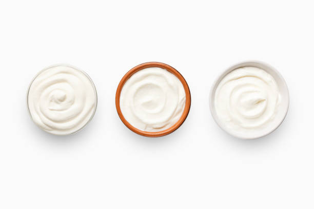 istock Set of bowls with sour cream 1125886020