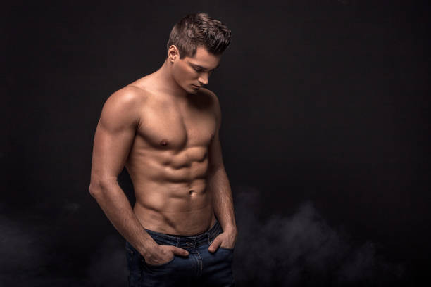 handsome shirtless man in studio. - sensuality men shirtless studio shot imagens e fotografias de stock