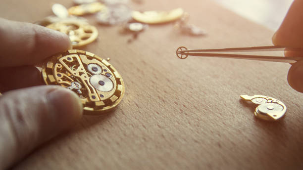 istock Watchmaker is repairing mechanical watches, close up 1125889134