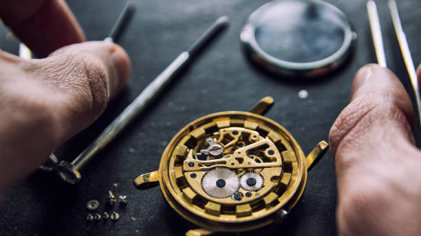 istock Process of installing a part on a mechanical watch, watch repair 1125889225