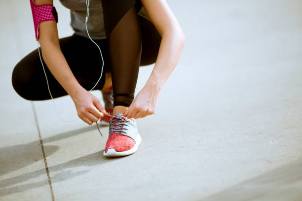 istock Young woman relaxing during exercise in the park 1125891658