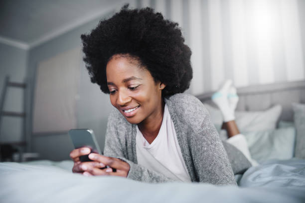 istock Kickstarting the day with a scroll though social media 1125892597
