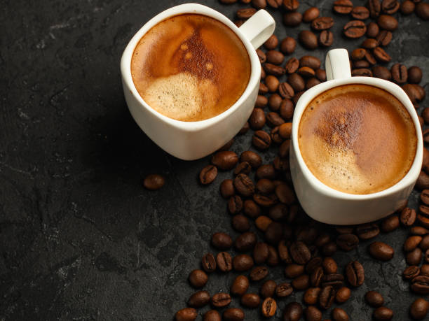 istock coffee, serving  beverage in a white cup (coffee grain). food. top.copy space 1125895029