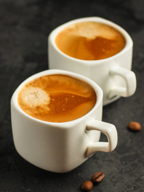istock coffee, serving  beverage in a white cup (coffee grain). food. top.copy space 1125895371