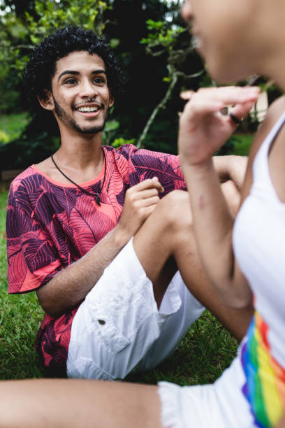 istock LGBT friends talking at the public park 1125896445