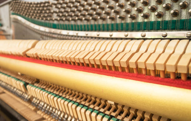 istock Close-up view of hammers and strings inside the piano. 1125896780