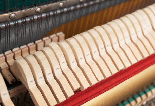 istock Close-up view of hammers and strings inside the piano. 1125896809