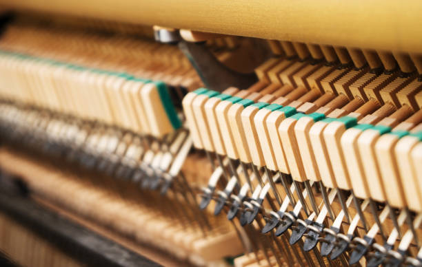 istock Close-up view of hammers inside the piano. 1125896816