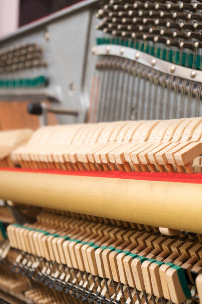istock Close-up view of hammers and strings inside the piano. 1125896835