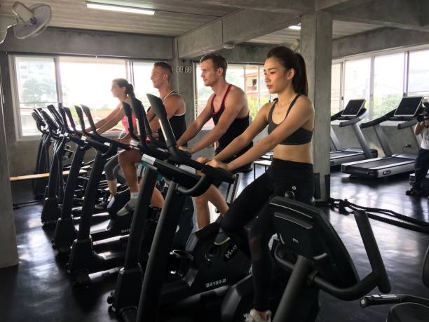 istock Friends Exercising In Gym 1125896867