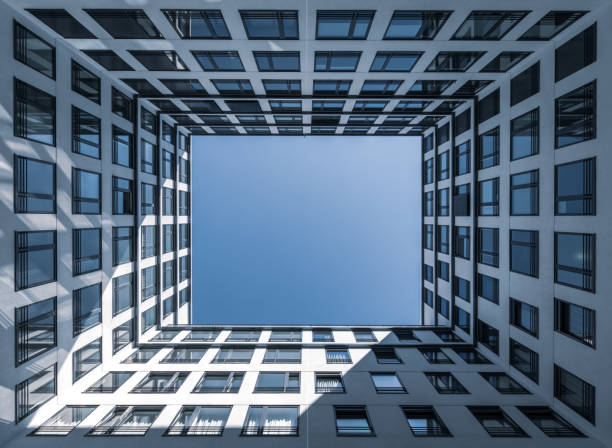 istock Directly Below Shot Of Modern Building Against Clear Sky 1125896943