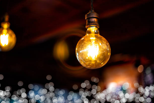 istock Close-Up Of Illuminated Light Bulb 1125901356