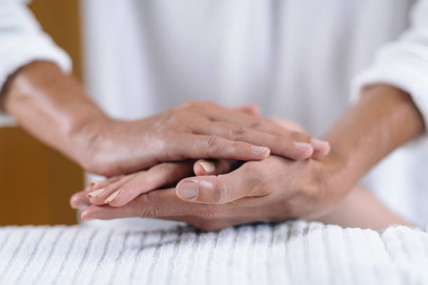 istock Cropped Hands Giving Massage To Women 1125901509