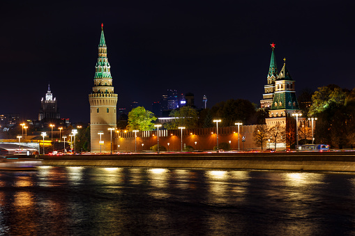 Towers of Moscow Kremlin at night with illumination. City landscape
