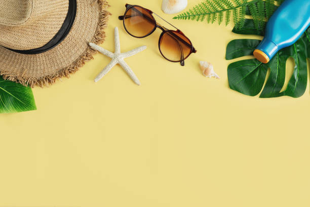 istock Travel accessories items on yellow background, Summer vacation concept 1125906426