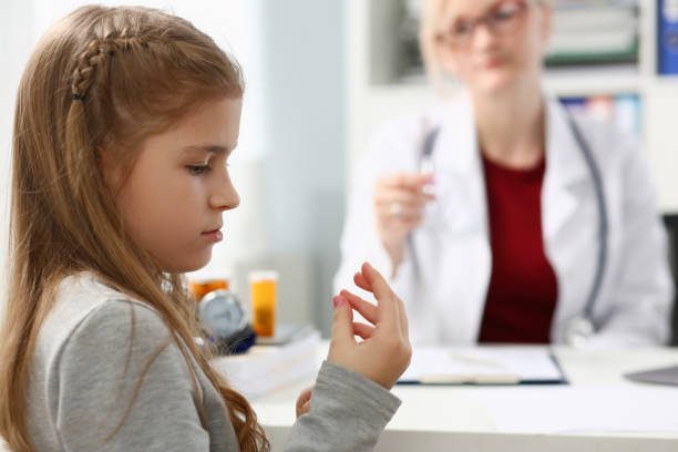 istock Little child at pediatrician receptionhold finger 1125906497