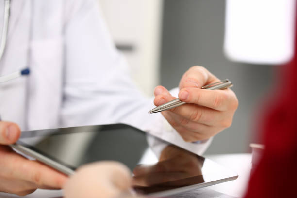 istock Female doctor hands hold and show digital 1125906603