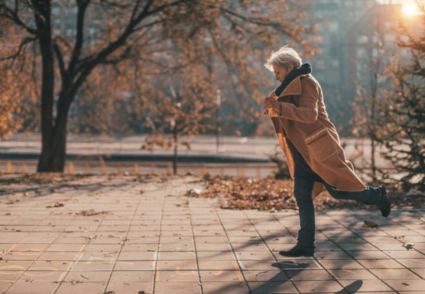 Senior woman having fun outside