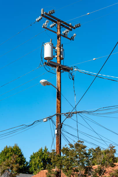istock electricity pole with street lamp 1125908182