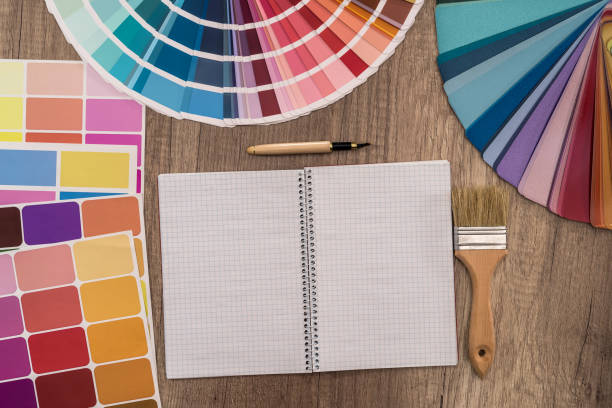 istock Top view of colour swatch and empty notepad 1125908853