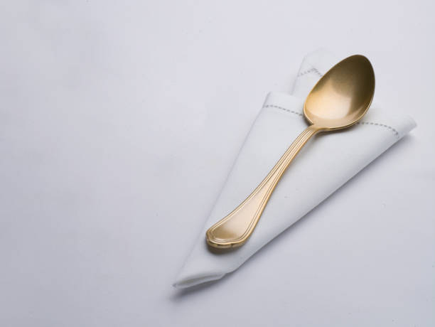 istock Blank white restaurant napkin mock up with spoon 1125908941